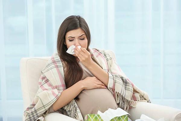 Bà bầu bị ho và sổ mũi có phải bị cảm cúm không?