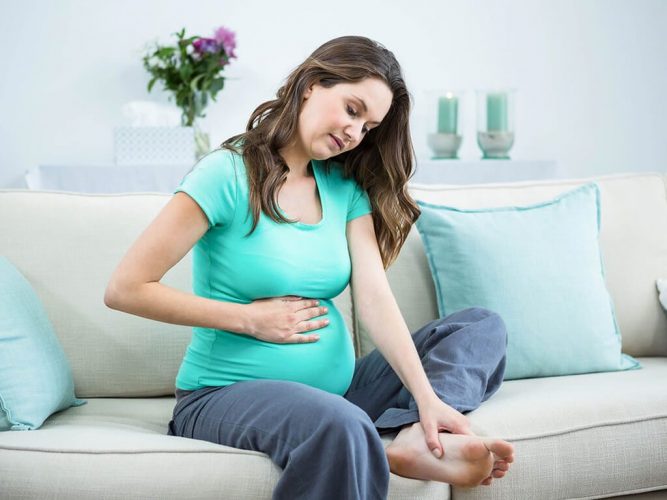 Nhức mỏi tay chân khi mang thai 3 tháng đầu là do đâu?