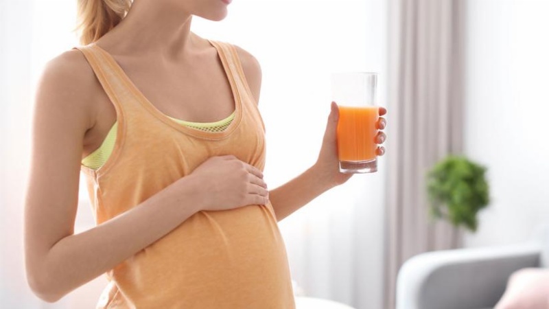 Mẹ bầu uống nước cam có tác dụng gì?